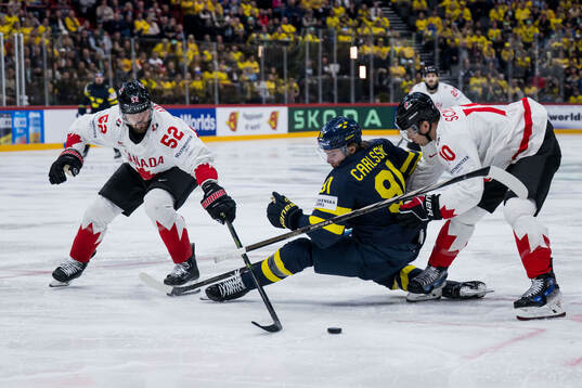 Leo Carlsson of Sweden against MacKenzie Weegar and Brayden