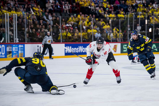 Marcus Johansson and Rasmus Sandin of Sweden against