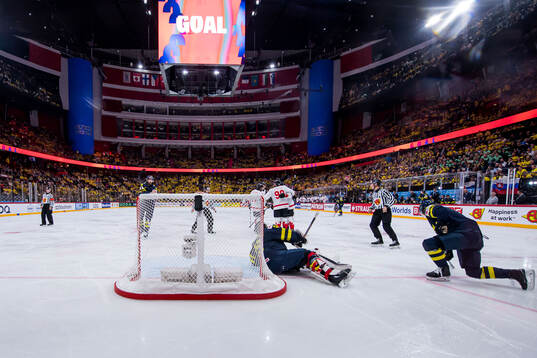 Goaltender Jacob Markström and Rasmus Andersson of Sweden