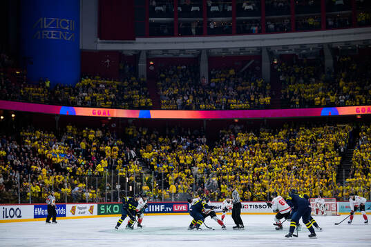 Isac Lundeström of Sweden and Ryan O'Reilly of Canada with