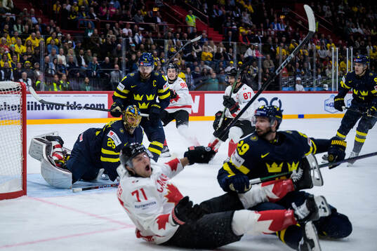Goaltender Jacob Markström, Rasmus Andersson, Marcus