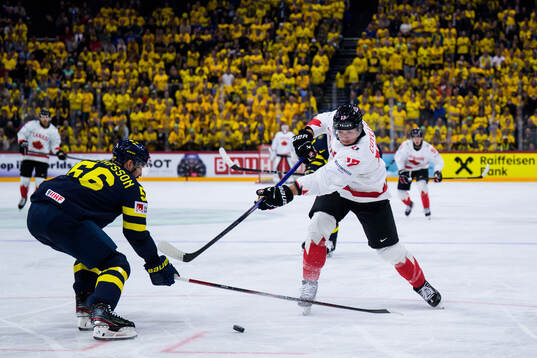 Erik Gustafsson of Sweden and Will Cuylle of Canada