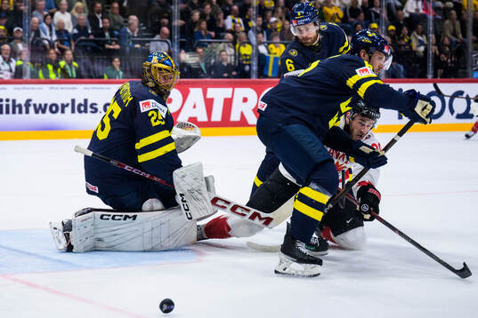 Goaltender Jacob Markström, Adam Larsson and Jonas Brodin