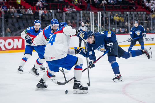 Mario Grman of Slovakia and Lenni Härmeenaho of Finland