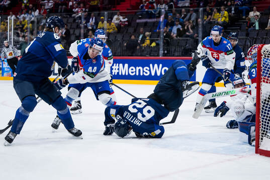 Mislav Rosandic of Slovakia and Juuso Parssinen of Finland