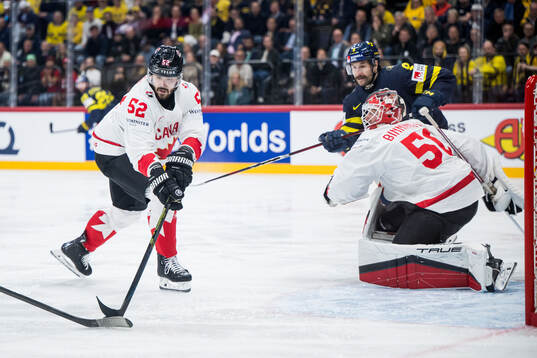 MacKenzie Weegar of Canada, Filip Forsberg of Sweden and