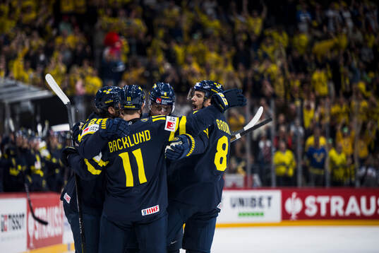 Elias Lindholm, Mikael Backlund, Adam Larsson and Jonas