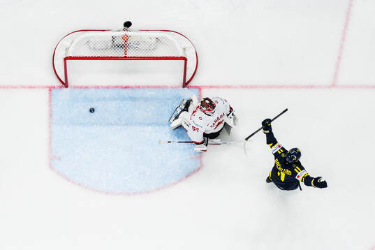 Mikael Backlund of Sweden celebrates the 1-1 goal  in front
