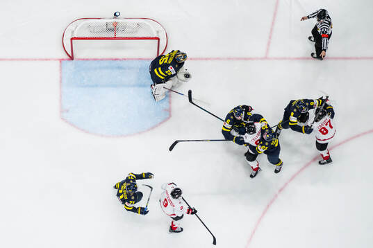 William Karlsson, Adam Larsson and Jonas Brodin of Sweden