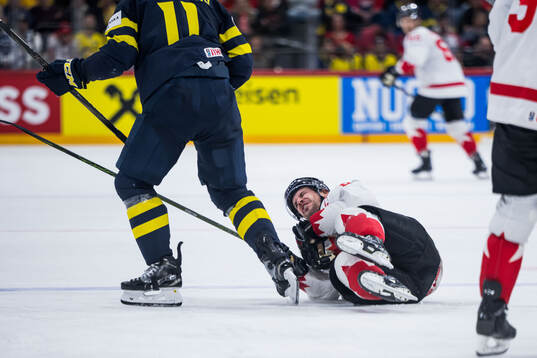 Sidney Crosby of Canada in pain