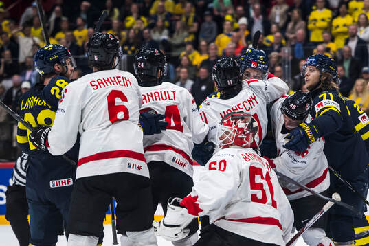 Travis Konecny of Canada and Filip Forsberg of Sweden