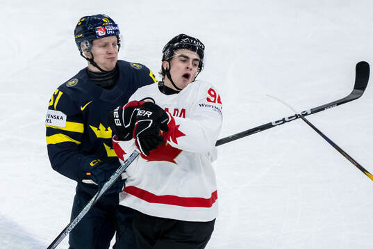 Emil Heineman of Sweden and Porter Martone of Canada