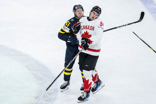 Emil Heineman of Sweden and Porter Martone of Canada