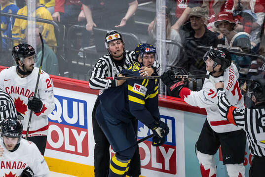 Mikael Backlund of Sweden and Tyson Foerster of Canada