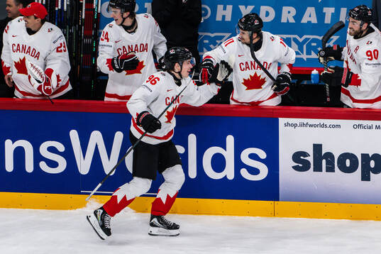 Macklin Celebrini of Canada celebrates the 2-4 goal