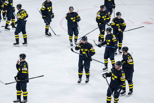 Adam Larsson of Sweden looks dejected