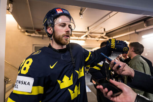 Elias Lindholm of Sweden in mixed zone