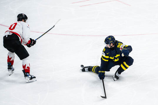 Brayden Schenn of Canada and Marcus Johansson of Sweden