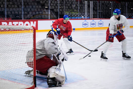 Goaltender Josef Korenar, David Kampf and Daniel Gazda of