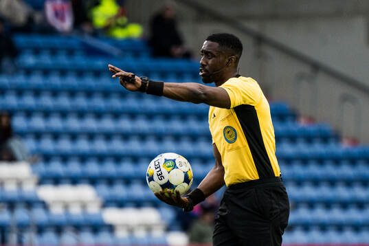 Domare Fredrik Oppong