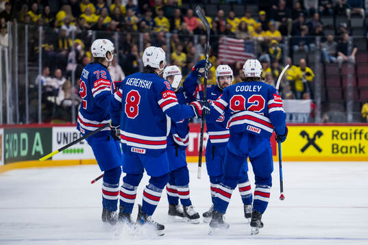 Conor Garland of USA celebrates