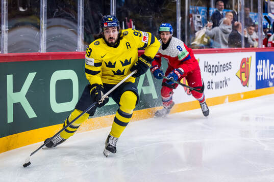 Mika Zibanejad of Sweden and Ondrej Beranek of Czech