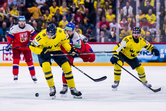 Marcus Johansson of Sweden and Filip Pyrochta of Czech