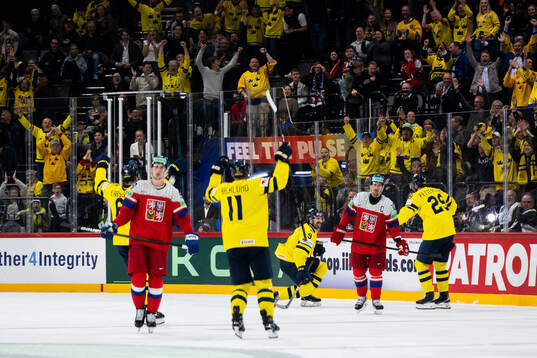 Adam Larsson, Mikael Backlund, Filip Forsberg, and Marcus