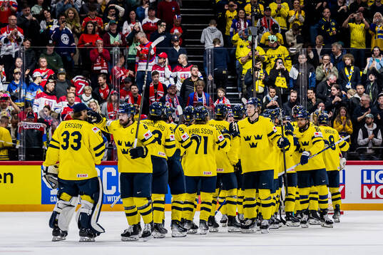 Players of Sweden celebrate