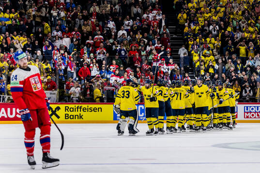 Players of Sweden celebrate