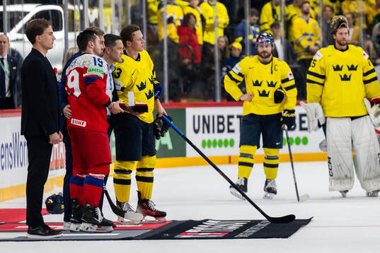Jakub Flek of Czech Republic and Lucas Raymond of Sweden