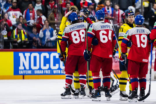 David Pastrnak of Czech Republic and Rasmus Sandin of Sweden