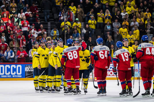 David Pastrnak of Czech Republic and Jesper Frödén of