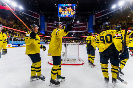 Isac Lundeström and Jonas Brodin of Sweden celebrate