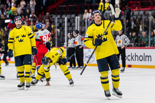 Jonas Brodin of Sweden celebrates