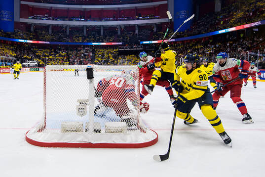 Goaltender Karel Vejmelka, Jiri Tichacek and David Spacek