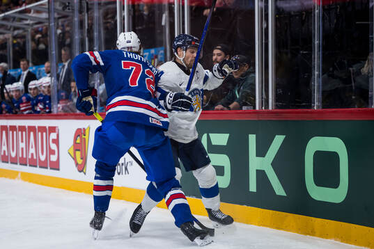 Tage Thompson of USA and Mikko Lehtonen of Finland