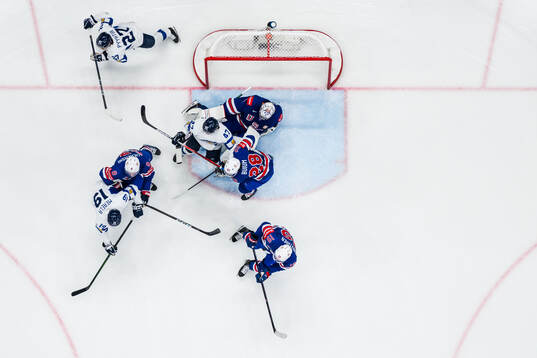 Zach Werenski, goaltender Jeremy Swayman, Zeev Buium and