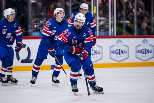 Conor Garland of USA celebrates