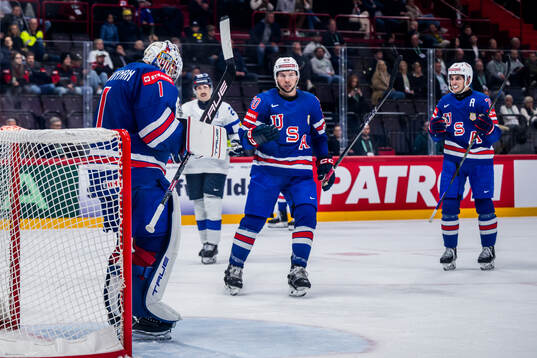 Jeremy Swayman of USA celebrates
