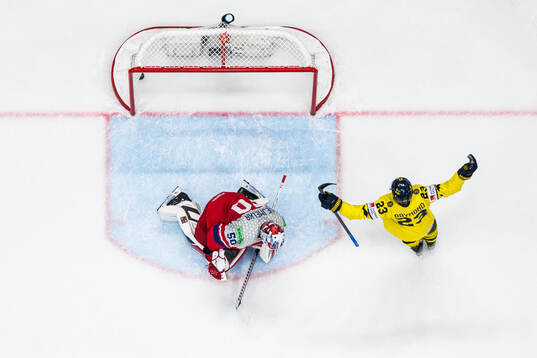 Lucas Raymond of Sweden celebrates the 3-0 goal in front of
