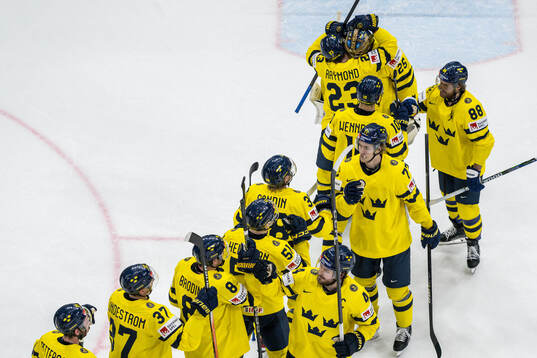 Jacob Markström and players of Sweden celebrate