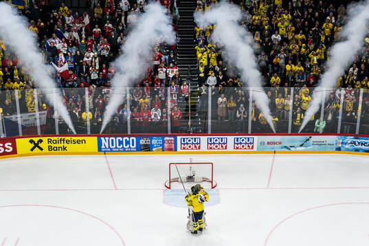 Jacob Markström and Rasmus Andersson of Sweden celebrate