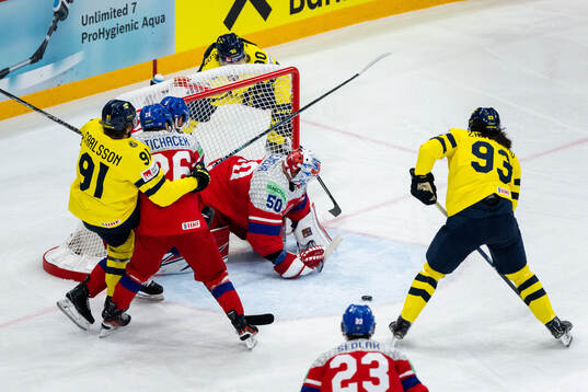 Leo Carlsson and Mika Zibanejad of Sweden as well as Karel