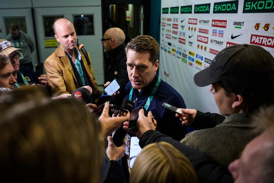 Head coach Sam Hallam of Sweden is being interviewed by