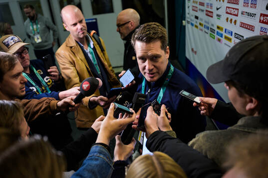 Head coach Sam Hallam of Sweden is being interviewed by