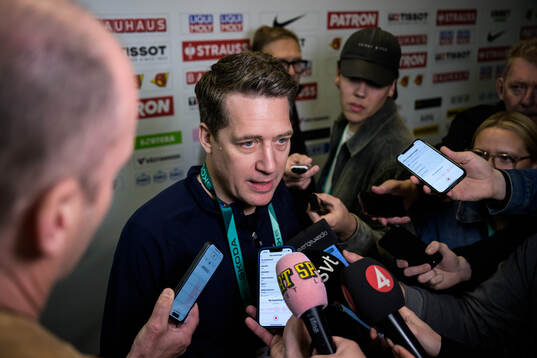 Head coach Sam Hallam of Sweden is being interviewed by