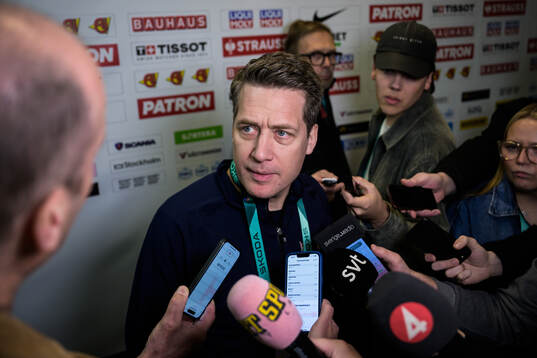 Head coach Sam Hallam of Sweden is being interviewed by