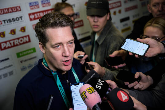 Head coach Sam Hallam of Sweden is being interviewed by