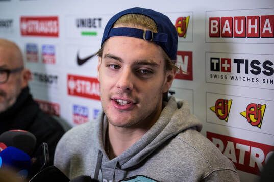 Leo Carlsson of Sweden is being interviewed by media at a